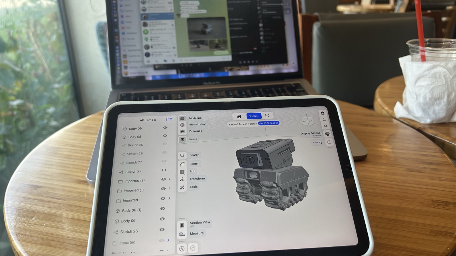 Modelling the tank dock in Shapr3D on an iPad next to a laptop
